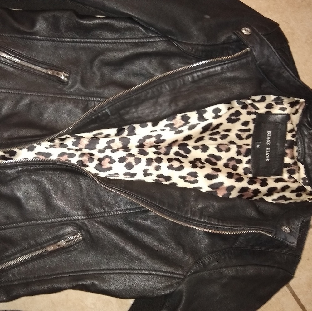 Black rivet genuine leather moto jacket.